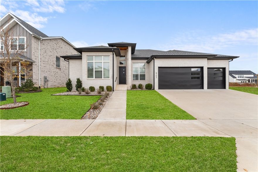 Experience upscale living in Aurora with this stunning single-level home. The open-concept design impresses immediately with a sun-drenched living room featuring custom beams and a linear gas fireplace. The heart of the home is the chef’s kitchen, equipped with a waterfall quartz island, double ovens, 5 burner gas cooktop, stainless steel hood, custom cabinets and a walk-in pantry. The primary suite offers a true spa experience, including a luxe ensuite with a soaking tub and a massive closet with built-ins and laundry access. Whether you are hosting in the dining room, mixing drinks at the bonus room wet bar, or relaxing on the covered patio by the outdoor fireplace, this home is built for entertaining. Includes three large secondary bedrooms and the flexible fourth bedroom that would be a perfect study. Aurora residents have access to TONS of community amenities. Adult pool, family pool, bike repair station, dog park, elevate fitness course, sports court, open air clubhouse & playground! Internet included in POA!