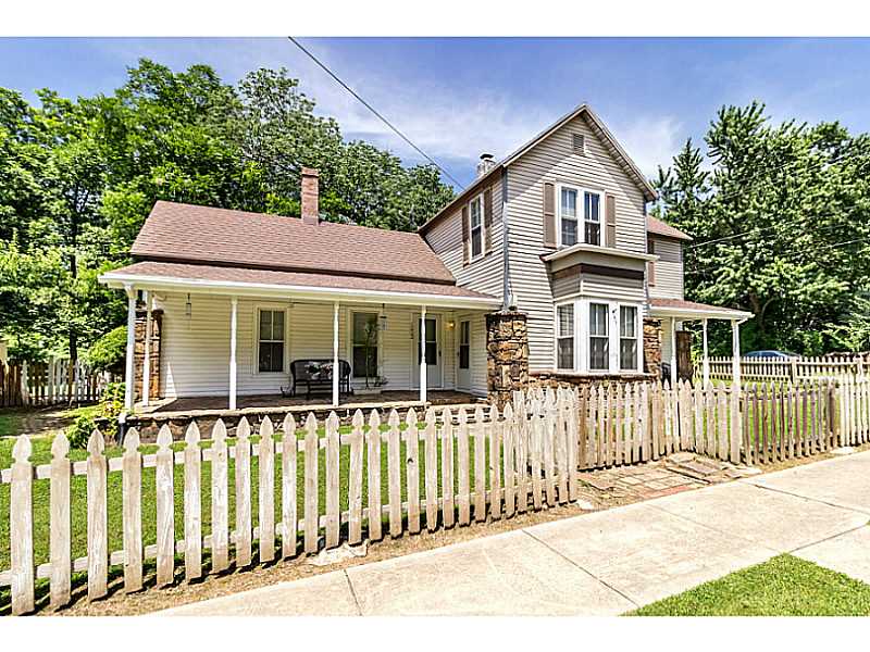 Picturesque historic 2-level home on 3 level lots, completely fenced. 2 front porches, pecan&shade trees, x-tra large detached 2 car garage, 2 new a/c units, all new plumbing & wiring; original pine floor in some rooms, hardwoods, & original hardware on,doors; detail molding; new tile work bathrooms/kitchen; walk in attic; furnishings negotiable; Blue flamed gas heaters in rooms; new water heaters; Walk to downtown; Must see to appreciate!! Seller to pay $3000 toward buyer's closing costs. Home warranty.