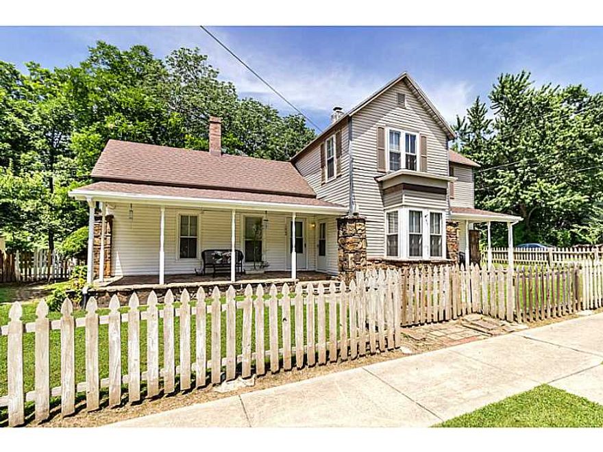 Picturesque historic 2-level home on 3 level lots, completely fenced. 2 front porches, pecan&shade trees, x-tra large detached 2 car garage, 2 new a/c units, all new plumbing & wiring; original pine floor in some rooms, hardwoods, & original hardware on,doors; detail molding; new tile work bathrooms/kitchen; walk in attic; furnishings negotiable; Blue flamed gas heaters in rooms; new water heaters; Walk to downtown; Must see to appreciate!! Seller to pay $3000 toward buyer's closing costs. Home warranty.