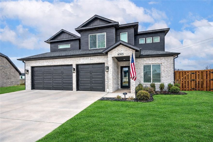 Experience modern luxury in the sought-after Aurora community with this stunning home. A beautiful exterior welcomes you into a bright, open floor plan with a striking living room featuring custom beams, a tiled linear fireplace & natural light from oversized windows. The impressive kitchen includes a large island, stainless steel appliances, gas cooktop, double ovens, custom cabinetry & a walk-in pantry. The main level offers a private primary suite with double sinks, extra storage, a walk-in tile shower & soaking tub, plus a versatile 5th bedroom for guests or a home office. Upstairs has 3 spacious bedrooms with walk-in closets & a bonus room for media/game space. The home is wired for surround sound with indoor/outdoor speakers & includes a whole-house water filtration system with softener. Select conveyances include an 85” TV & Weber grill. Enjoy outdoor living on the covered patio overlooking the expansive lot. Aurora amenities include pools, dog park, fitness course, sports court, clubhouse & playground.