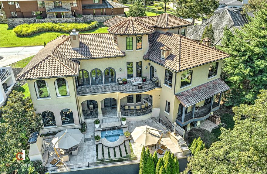 EXQUISITE GOLF FRONT PINNACLE ESTATE OFFERING BREATHTAKING VIEWS AND FEATURING 3 LEVELS OF LUXURY LIVING!  OVERLOOKING HOLE #5 OF PINNACLE COUNTRY CLUB’S 18 HOLE CHAMPIONSHIP GOLF COURSE, HOME TO THE LPGA NW ARKANSAS CHAMPIONSHIP, ENJOY STUNNING VIEWS FROM ALMOST EVERY ROOM IN THE HOME AS WELL AS MULTIPLE OUTDOOR LIVING SPACES WITH OUTDOOR KITCHEN, FIREPLACE, SPA, AND MORE!  Amenities include Smart Home Technology, Ambrosia Maple hardwood flooring, 24” travertine flooring, 11’ ceilings, professional grade appliances including Wolf, Sub-Zero and Thermador, 2 laundry areas, media room, mud room, exercise room, wine room, library, safe room, 500 sq ft bonus room & golf cart storage.  Lifts can be installed to accommodate 2 more cars in the garage.  Absolutely stunning offering one of the best views in Pinnacle Country Club!