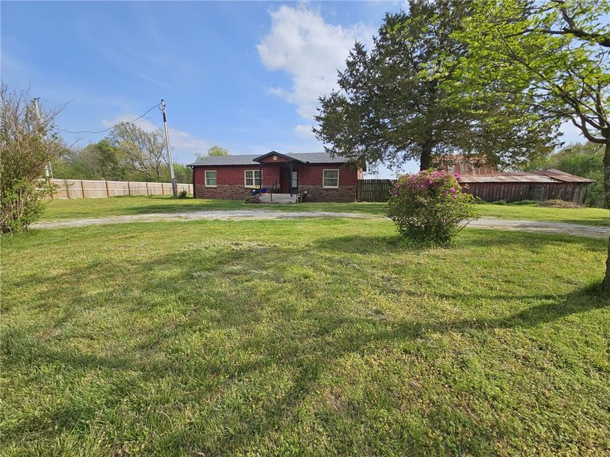 Two Homes on 5 Acres! Main house is very cute with fresh paint, encapsulated crawl space, new roof, some new floors, redone electric, new cabinets & counters, and remodeled kitchen. Second house needs minor cosmetic touches. Main house has crawl space, 10-year-old septic, and a working 50-gallon water heater.