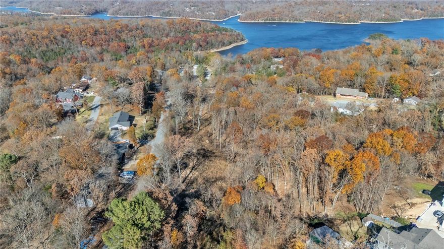 This 6.27-acre Prairie Creek gem is the kind of place folks dream about. Tucked into a beautifully wooded setting on Bluff Drive, it’s just a short walk to Prairie Creek Marina and only 10 minutes to Downtown Rogers. The land is perked, cleared in all the right spots, and ready for whatever you’re envisioning, a private custom build, an executive homesite, or even multiple residences.

The neighborhood has a strong track record, with nearby homes selling between the $400s–$800s, and it’s easy to see why. Peaceful, scenic, and full of that classic lake-area charm.

If lake life has been calling your name, this one’s worth the short drive. Come walk it, breathe it in, and picture what’s possible on a property like this.