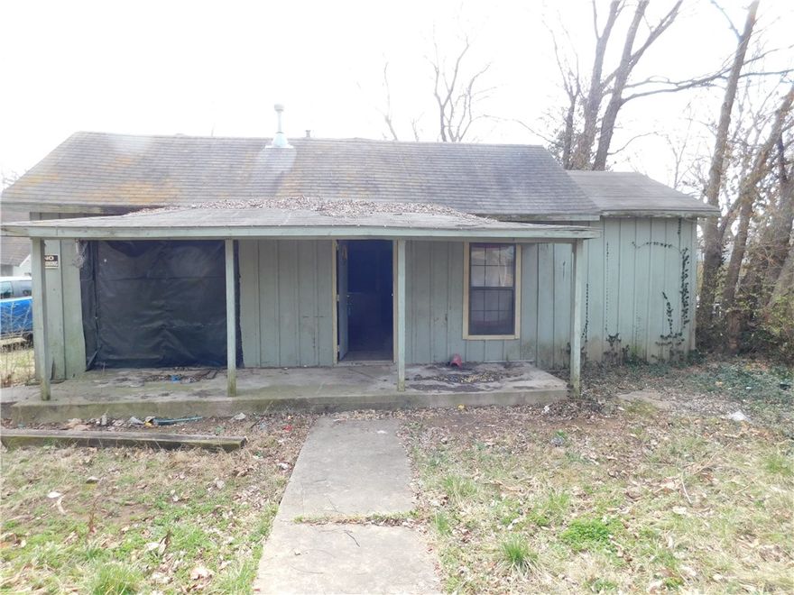 Opportunity awaits in West Fork. This property offers potential for renovation and customization, making it ideal for investors, flippers, or buyers looking to add value with a total remodel. Another option is to tear down the house and build a new home. But its also an option to build 3 townhomes, as West Fork recently rezoned this area and townhomes are allowed. Keep them as rentals or sell them individually. This lot is within walking distance to West Fork schools and offers a convenient location with quick access to I-49. This home is in bad shape and will need to be a cash purchase or inhouse loan with local bank. No repairs to be made by seller. Open to offers. AGENT OWNED. ALSO LISTED AS LAND WITH MLS # 1338285.