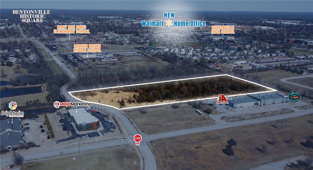 - Zoning allows for multifamily and/or commercial
- 0.6 miles to the new Walmart campus
- 1.8 miles to downtown Bentonville
- Utilities available
- Level lot ready for development
- Easy access to S. Walton Blvd & I-49
- C-2 Zoning
- Adjacent 5 acre parcel to the north is a protected nature preserve.