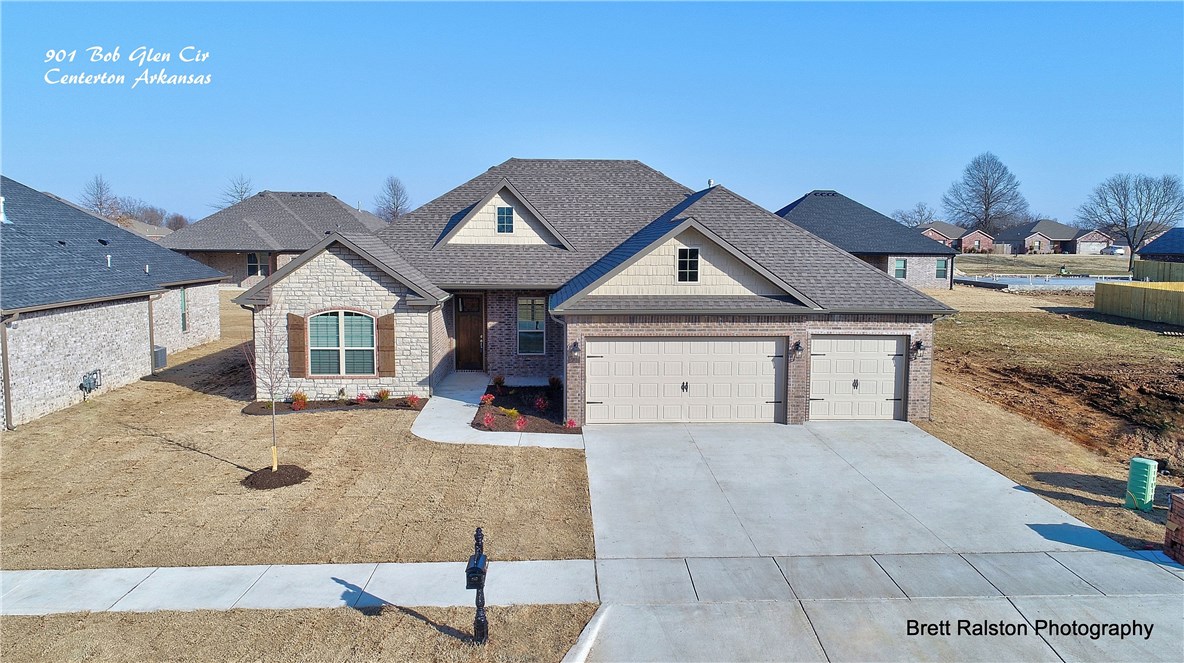 Welcome to your new home by NorthRock Builders in Bliss Meadows Subdivision. Built with over 20 years of experience this quality home features open floor plan. Full brick and stone exterior with a beautiful 8ft front door, 3 cm granite, wood floors, designer tiles and finishes, covered patio, double pane windows, custom cabinets and molding, ventless fireplace, tall ceilings, energy efficient appliances, and 3 car garage with smart phone connect.