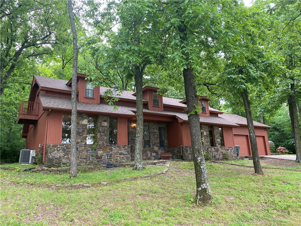 Recently remodeled home. Open floor plan. Updated kitchen w/ granite, wood flooring, new custom iron railing, & custom wood stairs. Large rock gas log or wood burn fireplace, 2nd fireplace in the master bedroom. Over an acre lot partially wooded. Basketball court in the side yard, incredibly large game room, Two stairwells on each end of the house. Two of the upstairs bedrooms have balconies. Lots of cabinets & counter space in kitchen, double ovens, formal dining & eat-in breakfast room. Large 2nd living area. Large utility room & garage with a shop. Circle drive & lots of parking. Outdoor shed with storage. Fayetteville/Root school district. Excellent floor plan for hosting events, long term guests, or lots of kids. Convenient to shopping, grocery & restaurants.