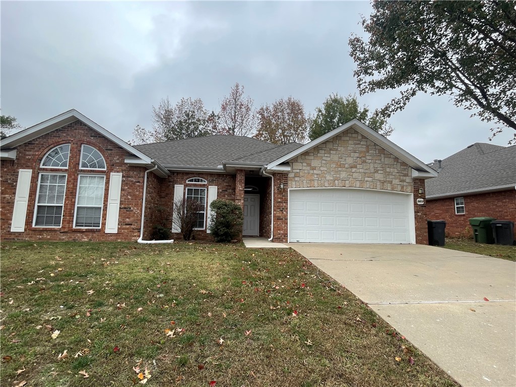 Don't miss this fantastic opportunity in this PRIME LOCATION, just minutes from I-49, shopping, Reagan Elementary, and steps from the Rogers Greenway Trail! The spacious living room features a cozy wood-burning fireplace with gas starter open to the adjoining formal dining area, just perfect for entertaining. Kitchen offers stainless steel appliances, a tray ceiling, and a breakfast area. The primary suite offers a very spacious walk-in closet, tray ceiling, private bath with jetted tub, and walk-in shower. Enjoy the large, fully-fenced backyard with mature trees and a partially covered patio. Or, perfect location for your next investment opportunity!
