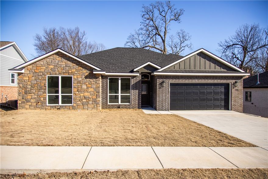 Welcome to your wonderful and very comfortable new home in Cave Springs, the jewel of Northwest Arkansas. This amazing brick and rock home has an awesome open floor plan with 4 bedrooms, two full baths and walk-in closets in 3 bedrooms. Many custom features include ceiling fans, granite counters, tall ceilings, lighted mirrors, a utility sink, and oversized windows that let you see the sky, extra storage, security lights, LED lighting. The gourmet kitchen has cabinets to the ceiling, a spice rack, soft close hinges, 2 pantries, large drawers, a tip tray, pull out trash cans and a wine rack. Level fenced backyard with huge covered patio. Don't miss the opportunity to live in the center of Northwest Arkansas in a fantastic family friendly neighborhood. Easy access to i-49, Wal-Mart Home Office J B Hunt, Promenade Mall, restaurants and schools. XNA National Airport is only a few minutes away.