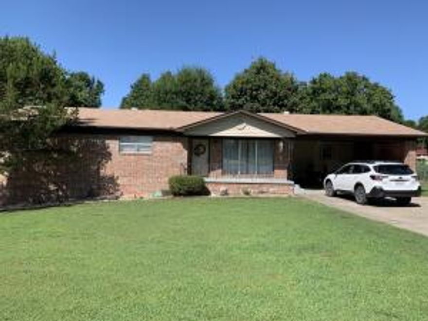 Brick and vinyl home on a nice level lot with trees and fenced on 3 sides end of road very private this home has 3 level deck newly painted .approximate 1745 sq ft heated and cooled and  992 unfinished basement with heat and air ducts basement could be finished but there is lots of storage .large kitchen with lots of cabinets one bath has been completely remolded large workshop in the basement ceiling fans in every room double carport  This is a one owner home ,newly painted living room and hallway .