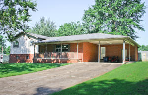 Beautiful open floor plan 3 bed 2 bath home with slate style ceramic tile, beautiful wooden doors, custom Parkhill cabinets with additional finished living area in basement, on a manicured yard. Remodeled in 2011. Enjoy life on a quiet, peaceful street.