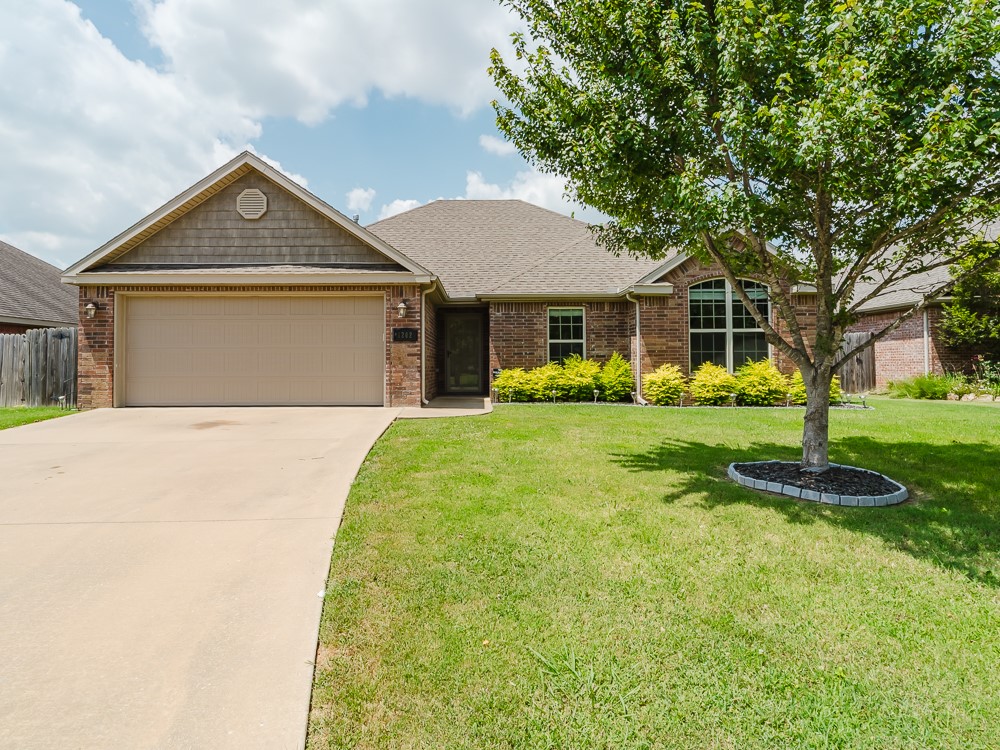 This home features 3 large bedrooms, 2 baths and full of charm. Nearly 1850 sq. ft of living space in the heart of Bentonville with bike trails and new park minutes away. Professionally landscaped. Stunning interior finishes throughout. Granite countertops, island bar, large pantry, & full appliance package. Dual vanities, beautiful custom tile standalone shower and soaking tub in primary bath suite. Covered back porch area to enjoy!