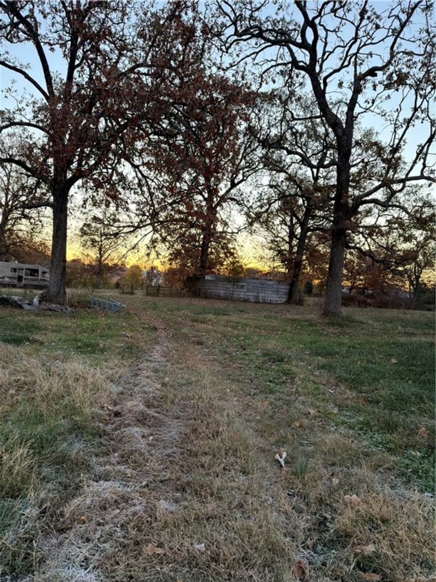 Enjoy this 4.38+/- acres with no restrictions. Located just outside the city limits! Whether you’re looking to develop, have a hobby farm, invest, or build your dream home, this versatile piece of land offers lots of potential. Its proximity to town makes it an ideal location. Enjoy this peace of rural living with the convenience of being less than 3 miles from downtown, shopping and schools. Mobiles homes allowed.

Buyer to verify utilities.

There is access to property via deeded easement.

Survey in picture is for reference. Official Survey to be completed soon. Seller willing to divide into two parcels.