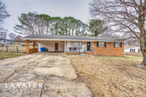 Come take a look at this recently update 3 bedroom 2 bath home. Roof only 10 years old, newer CH&A, open concept, wonderful kitchen with concrete countertops, new floor coverings and appliances, a deck with hot tub, and wonderfully updated bathrooms. You will love the cedar lined vaulted sunroom! Inside the chain linked fenced yard there is a 20x16 insulated shop building part of which is currently used as an at home office. This is definitely one you don't want to get away.