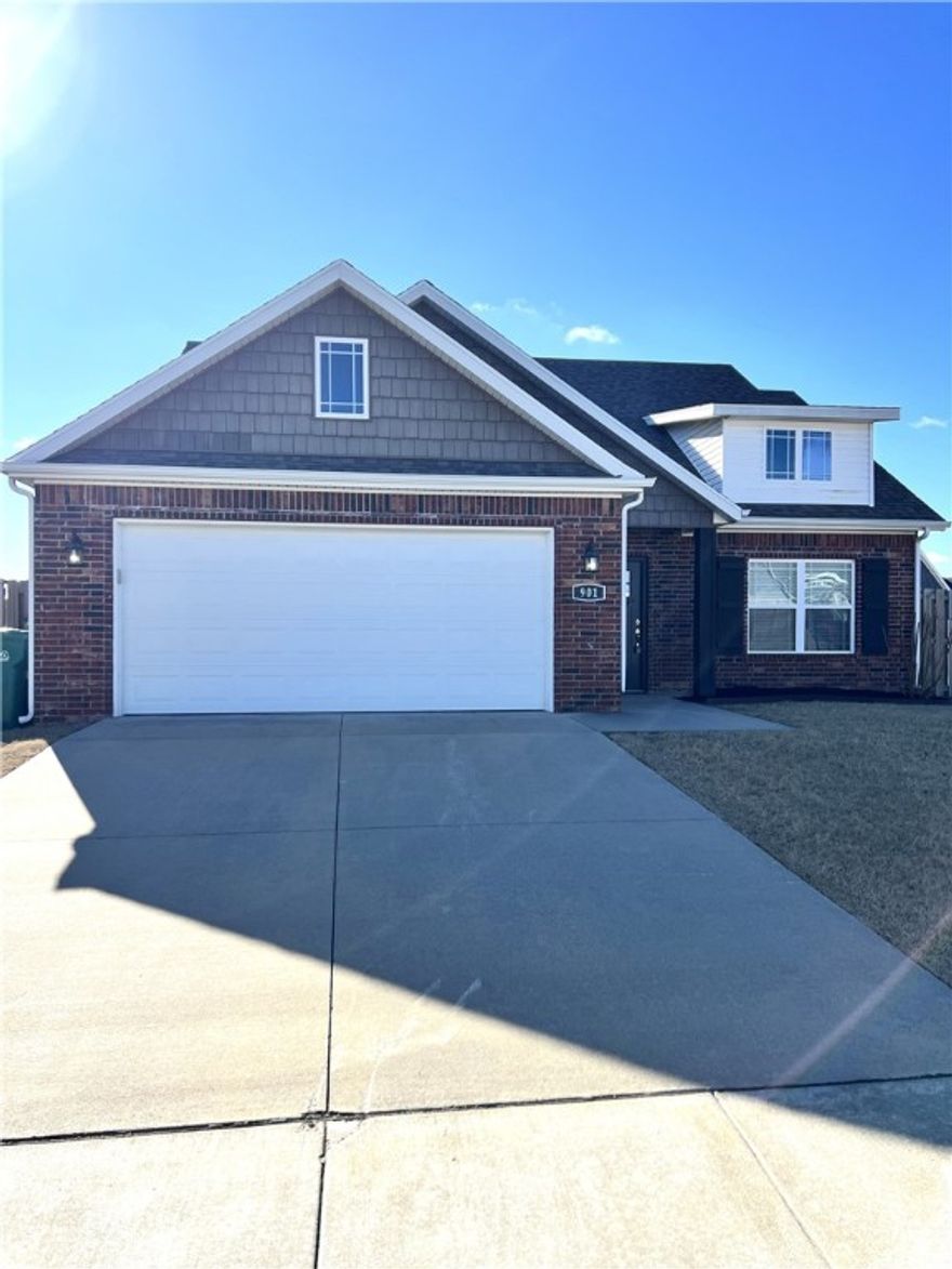 Well-maintained 3-bedroom, 2.5-bath home featuring upgraded wood and tile flooring throughout main living areas, with carpet in all bedrooms. The spacious living room includes a gas fireplace and offers a functional layout ideal for everyday living. A bright breakfast room adjoins the kitchen, creating a comfortable dining space. The primary suite includes a walk-in shower and whirlpool tub. Enjoy outdoor living with a covered patio, accessible through a patio door with built-in blinds, and a wood privacy-fenced backyard. Washer, dryer, and refrigerator included. Tenant responsible for all utilities and lawn care. Convenient, comfortable, and move-in ready.