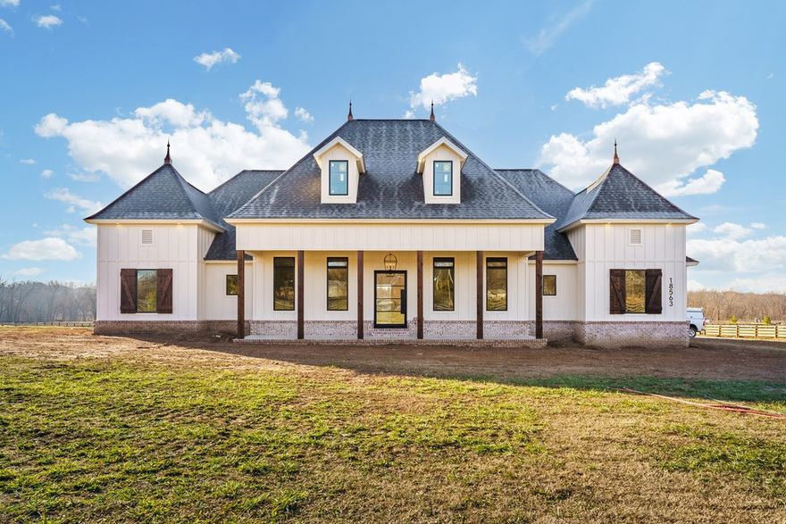 Gorgeous French Country Estate Home on 3.5 Acres! This stunning property offers the perfect balance of serene country living and convenient proximity to town. With 4 bedrooms, 3.5 baths, and an open-concept design, this home is ideal for entertaining and everyday luxury.

The chef’s kitchen features a gas cooktop, vent hood, and elegant finishes, flowing seamlessly into the spacious living area. The thoughtfully designed floor plan includes all the upscale touches you’d expect in a premier estate, along with a 3-car garage and a concrete-enclosed safe room for added peace of mind.

Step outside to the expansive outdoor living area and take in breathtaking views of the Flint Creek Valley—perfect for gatherings or relaxing evenings. Situated on the final lot in a prestigious 9-lot estate subdivision, this home truly stands out as a must-see gem.

Don’t miss your chance to experience this incredible property—schedule your showing today!