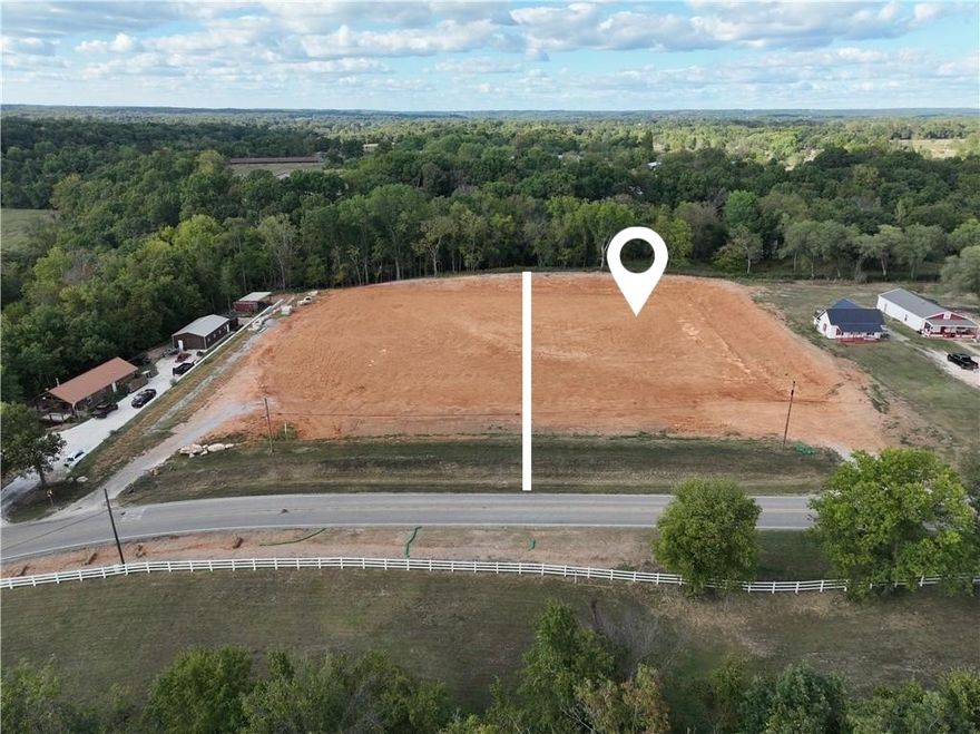 Unlock the potential of this prime 1.94-acre commercial lot with excellent road frontage in the growing community of Pea Ridge. This property offers a unique opportunity to establish your own business in a growing area, complete with essential utilities including public water, gas, electric, & sewer. Located just minutes from local amenities such as Walmart Neighborhood Market, Pea Ridge City Park, & Big Sugar Golf Club, this lot provides convenient access for customers & clients. Its strategic location ensures high visibility & traffic, making it an ideal site for retail, service, or office space. Zoned for multi family & has been conditionally approved for 40 townhomes. Also, approved for a RV/trailer storage facility with approved engineered plans by the city. Don’t miss out on this opportunity to invest in a rapidly developing area. Make your mark in Pea Ridge today!