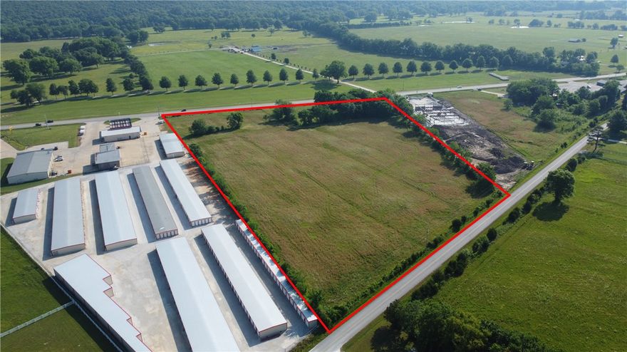 This fabulous piece of land is situated in the heart of Elkins. Level acreage on the south side of Highway 16 with lots of potential and possibilities! Utilities are at the street.  621 feet of Highway 16 frontage, 413 feet of Harris Road frontage to the south. This property is situated between the new Dollar General and Elkins Mini-Storage, is 4/10 mile from Sonic and 8/10 mile from Harp's and O'Reilly's Auto Parts.  If you're looking for the perfect place for your business, then look no further!