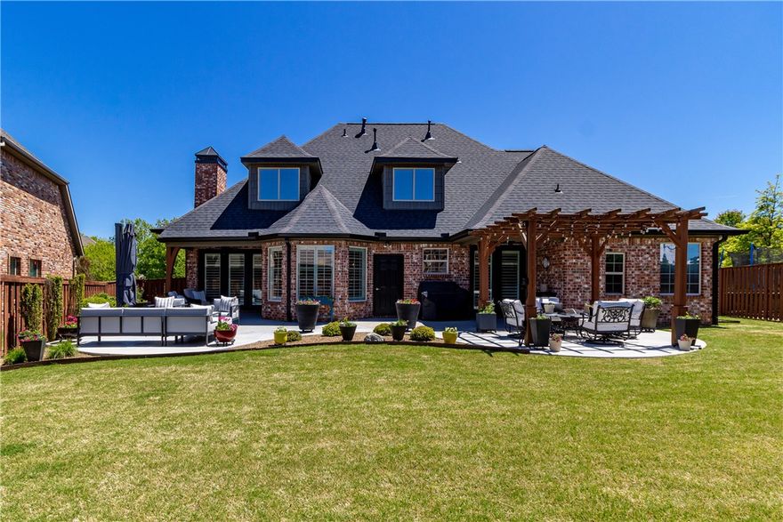 Check out this luxurious remodel in the coveted Chapel Hill subdivision complete with custom finishes and a picture-perfect outdoor living space with a covered patio and pergola. You are within walking distance to Crystal Bridges Museum of American Art, close enough to jump on your bike to multiple trails, and just down the road from Downtown Bentonville, The Momentary, and 8th Street market, which means you can get to the new Walmart Global Campus & I-49 in minutes. This fabulous community offers a clubhouse, swimming pool and lovely walking trails. You do not want to miss this exceptional home located in the heart of all things Northwest Arkansas.