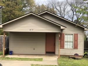 This quaint home of 1,152 is perfect for a large family on a budget. With 4 bedrooms and 2 baths and a large fenced in backyard, this home won't be on the market long. In addition to the home, there is also a storage shed, playhouse, and bunkhouse with a loft in the backyard.