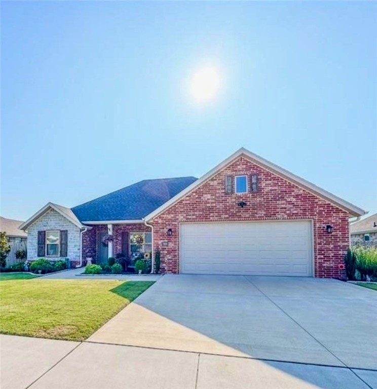 Welcome to your dream homeāwhere charm, comfort, and energy efficiency meet! This all-brick beauty features owned solar panels (free & clear!) with an avg electric bill of just $31/month. Nestled in a quiet neighborhood, enjoy custom landscaping, a fully fenced backyard, and a covered patio perfect for entertaining. Inside, youāll love the barn door, custom dining light, upgraded ceiling fan, and gas fireplace with premium logs. The kitchen is warm and inviting with a gas stove, under/above cabinet lighting, and dimmer switches throughout. Smart features include a Ring doorbell, hardwired Ring security cameras (front & back), Ecobee thermostat, and a tankless water heater. The garage is insulated and has an upgraded opener. All curtain rods convey. With modern finishes, smart-home upgrades, and ultra-low utility costs, this home is the perfect blend of function and comfort. Donāt miss your chance to own this exceptional move-in-ready gem! Sellers are in the process of getting a new roof.