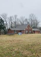 Location, Location, Location! This home offers 12.35 acres which borders Gala Creek and has a stocked Pond. Deer are frequently in the area. A beautiful 2,598 sq. ft brick house with cathedral ceiling and open concept living room. It has 4 and potentially 5 bedrooms and 3 bathrooms. This is the one!