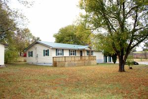 COMPLETELY REMODELED HOME NEAR BULL SHOALS LAKE! You must see the interior of this 4BR/3BA w/ 1850 sq. ft w/ Storm Cellar! Sitting on almost .7 ac w/ an Attached 3 Car/Boat Garage, 2 Master BR Suites, H-Wood Floors, AWESOME Master Bath w/ Dual Sinks, Big Walk-In Closet & HUGE Tiled, Walk-In Shower! Lovely Modern touches throughout w/ Custom Cabinets in Kitchen/Bathrooms. See Supplement for More!