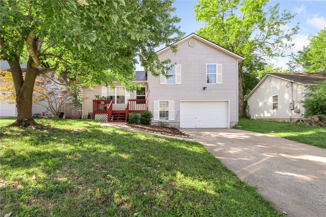 This all-electric home offers a spacious kitchen with plenty of cabinet space. The exterior features low-maintenance vinyl siding, a 1-car garage with a handy workbench, and a portable A/C, heat, and dehumidifier that will stay with the property. A completely fenced backyard is ideal for pets, play, or entertaining. Enjoy peace of mind with a newer HVAC system (2019). A small storage building also stays with the property, providing even more storage space.