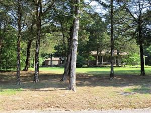 Please welcome this home to the market for the first time ever! It has been cared for very well but is currently looking for a new owner to love and appreciate it! Situated on 1.8 acres, this home has a wonderful shady yard with plenty of privacy. Inside you will find a suite with large bedroom, walk in closet, bath with walk in shower and walk out door to the deck. The suite also has an additional room attached that can be used as a living area, exercise room or office. Cathedral ceiling in the large living room! Garage is oversized and perfect for 2 cars, but there is a detached garage that will hold another vehicle and still leave you a workshop or man cave room! Call today to schedule a showing!