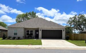 Move in Ready! Summer will be the perfect time to meet your new neighbors in this quiet neighborhood! Split floor plan with three bedrooms complete with lots of storage space! Double garage and privacy fenced back yard perfect for your summer time enjoyment! Call me or your favorite realtor for an appointment to view this cute home!