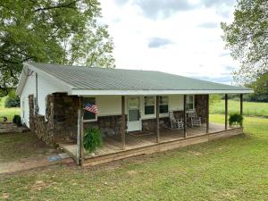 This house is surrounded by beautiful rolling fields and provides the quiet and comfortable feel everyone is looking for. This won't last long! New Paint and New Carpet!