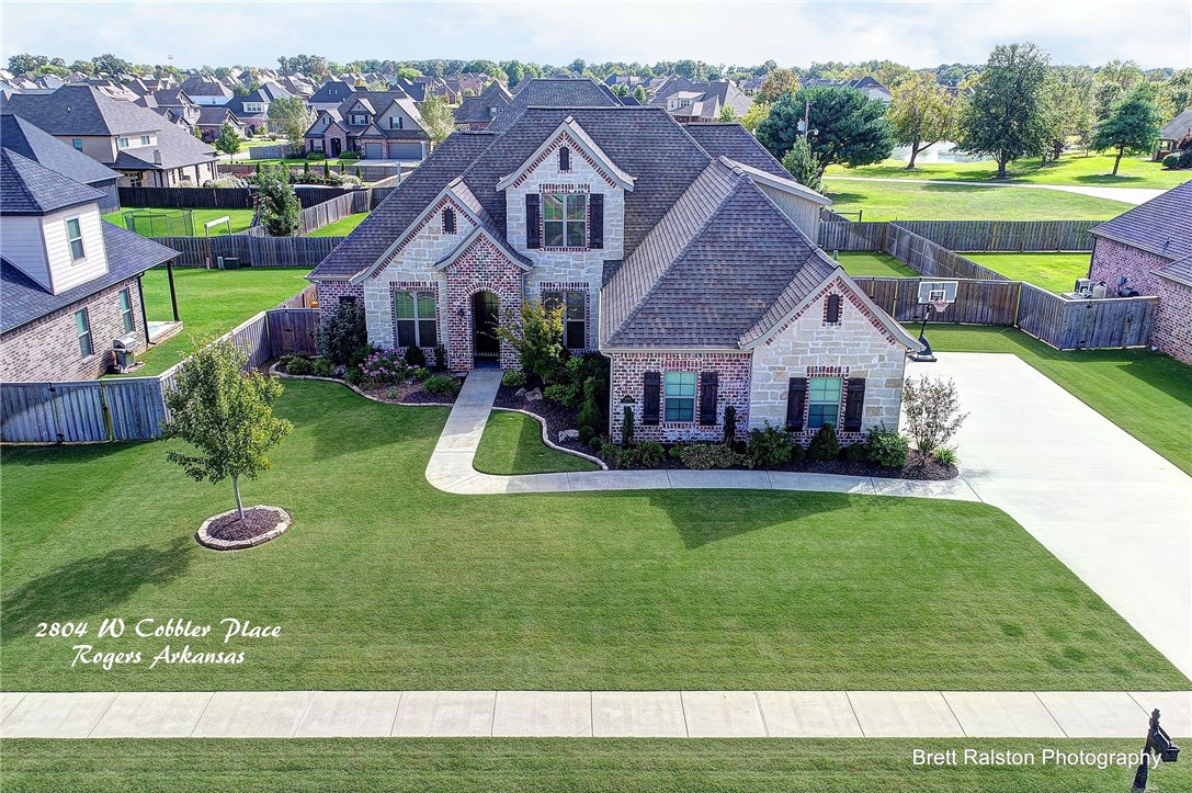 Elegant Family home in Silo Falls Subdivision, Landmarc custom built home with many extra amenities- 4 bedrooms, 3 1/2 baths, Bonus room, Formal dining, & office. Walk-in closets, Granite counters, hardwood flooring, dream kitchen w/ lots of custom cabinets that go up to the ceiling and stainless appliances, side load 3-car garage w/tornado shelter, large driveway for kids to play. Wood Privacy fence in backyard. Covered back patio, quiet cul-de-sac street, neighborhood has community playground and pool.