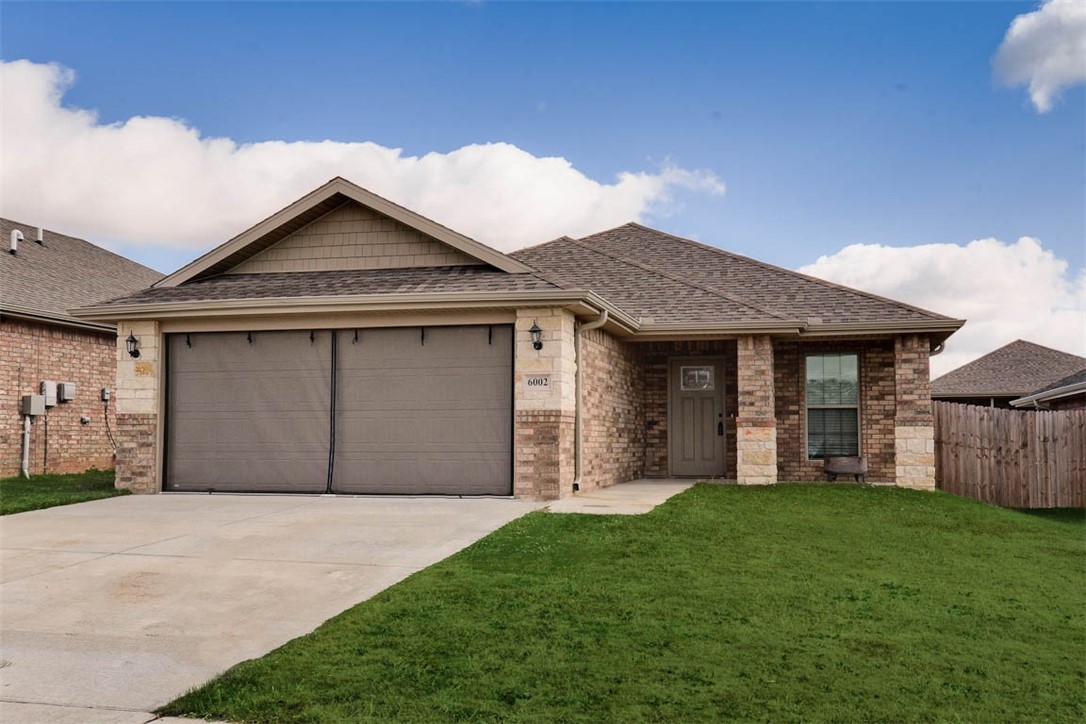 Turnkey home built in 2020 boasts tons of curb appeal! This spacious open concept offers lots of natural light throughout. Large eat-in Island, pantry, and gorgeous granite in the kitchen; wood-tile flooring extends throughout main areas. Outdoors, you'll find a privacy fenced back yard, covered patio, and lush grass. Located just 11 minutes from the XNA Airport! Also, enjoy the use of the Woodward Hills dog park.