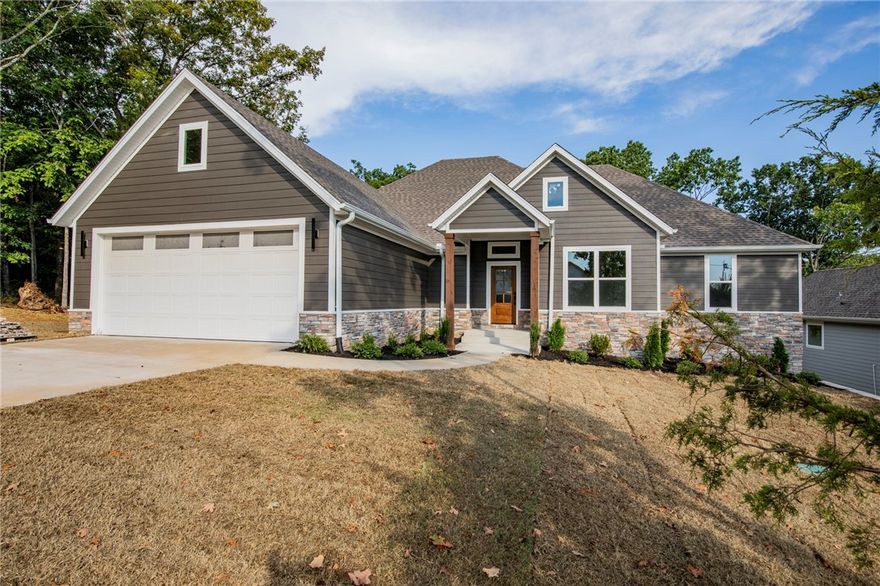 Welcome to your dream home in beautiful Bella Vista! This brand-new construction combines modern elegance with timeless comfort. From the moment you step inside, you’ll be greeted by an open floor plan filled with natural light—perfectly designed for everyday living and effortless entertaining.

The spacious living room centers around a stunning fireplace, offering a warm and inviting space to gather. The gourmet kitchen is sure to impress, featuring sleek countertops, premium appliances, and abundant storage for all your culinary needs.

Retreat to the luxurious primary suite, complete with spa-inspired amenities and a serene en-suite bath that feels like your own private escape. Additional bedrooms provide plenty of space for family, guests, or a home office.

Blending high-end finishes, thoughtful design, and exceptional craftsmanship, this home truly has it all. Don’t miss the opportunity to make it yours!