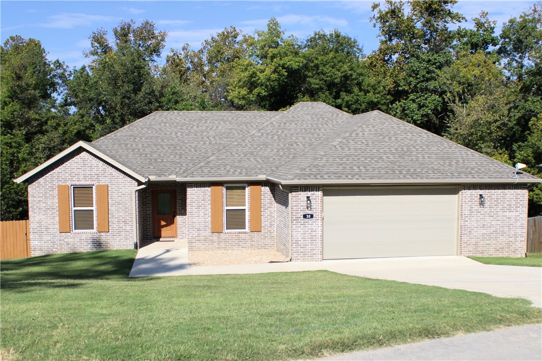 LIKE NEW and PRICED TO SELL!! Beautiful 3 Bedroom, 2 bath home split floor plan with a professional office/study. Located close to Branchwood Recreation Center, Loch Lomond and I-49 Bypass! Enjoy the view off of your back porch of the woods and a creek. Enjoy the privacy! Large fenced in backyard with no neighbors behind you. Open living room/Kitchen with a gas fireplace, Stainless Steel appliances in the kitchen with a walk-in pantry. Laundry room connects to the master closet. Granite countertops. Large 2.5 car garage! Wood look ceramic tile in main areas, marble like ceramic tile in bedrooms.