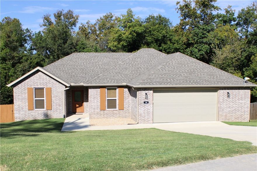LIKE NEW and PRICED TO SELL!! Beautiful 3 Bedroom, 2 bath home split floor plan with a professional office/study. Located close to Branchwood Recreation Center, Loch Lomond and I-49 Bypass! Enjoy the view off of your back porch of the woods and a creek. Enjoy the privacy! Large fenced in backyard with no neighbors behind you.  Open living room/Kitchen with a gas fireplace, Stainless Steel appliances in the kitchen with a walk-in pantry. Laundry room connects to the master closet. Granite countertops. Large 2.5 car garage! Wood look ceramic tile in main areas, marble like ceramic tile in bedrooms.