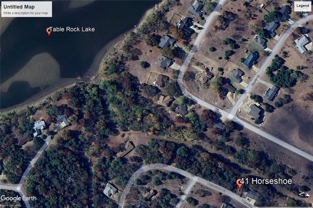 Ready for your dream home? This lot is a block from the Holiday Island Recreation Center and a short walk to the water. Quiet and gently wooded within a neighborhood, this lot offers the best of both worlds. Enjoy the amenities in Holiday Island like golf courses, a country club, swimming, tennis and a marina with a fishing dock or watch the local fauna from your front porch! Nearby Eureka Springs or Rogers offers great shopping and vibrant cultural hubs.