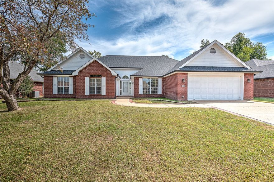 This 3 bedroom/2 bath BEAUTY is a GEM and offers AMAZING updates throughout all in one of the best locations in Rogers just minutes from shopping, entertainment, hospital, dining and the new Walmart campus!  NEW ROOF & GUTTERS, NEW BLINDS THROUGHOUT, NEWER WATER HEATER, NEW FLOORING in living, dining and bedrooms, NEW PAINT, NEW LIGHT FIXTURES and more!!  PLUS, a brand-new wood privacy fence in the GORGEOUS backyard that has been stained and sealed!! Fabulous open floor plan boasting two inviting living areas, each bathed in natural light and overflowing with charm!  The bright, open living room features new windows and a new French door leading to a beautifully spacious backyard—perfectly set for a pool, garden, and family fun. Kitchen offers a functional layout with new dishwasher & sink, and a breakfast nook!  New garage door motor in 2 car garage!  Walk to the neighborhood park!! Meticulously maintained and lovingly cared for, this turnkey home is move-in ready and waiting for its next owner!