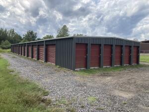 Great investment opportunity. This is your chance to own an income producing mini storage and ice machine. There is also room for more buildings on the property.