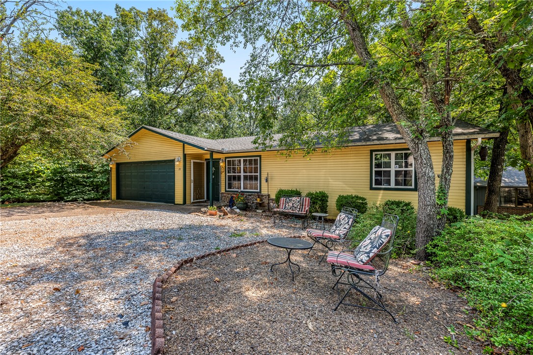 Come see this wonderful home, close to all the amazing amenities that Bella Vista has to offerāincluding scenic lakes and bike trails! This great home features two bedrooms and two full baths. There's a beautiful sunroom currently used as a second family room, which could easily be converted into a third bedroom. Enjoy a nice fenced-in backyard and a private deck off the sunroom. The garage offers plenty of storage space, including a cedar closet. You'll also love the built-in bookcases in the sunroom. Come see this lovely home today!