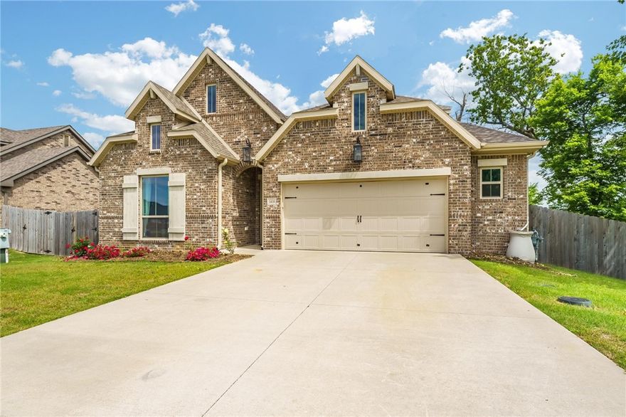 Located in a highly desirable neighborhood, this spacious 4-bedroom, 3-bath home offers a perfect blend of style, comfort, and convenience. The open-concept layout is designed to maximize space and natural light. 
The main floor features three generously sized bedrooms, including the luxurious primary suite, which boasts serene lake views. The en-suite primary bathroom offers double sinks, a walk-in shower, and a separate soaking tub—ideal for relaxing after a long day.
Upstairs, you’ll find an additional bedroom, a full bathroom, and a flex space—perfect for a home office, playroom, or guest suite.
The heart of the home is the modern kitchen, complete with granite countertops, a large island for gathering, and a walk-in pantry for ample storage.
Situated within walking distance to Mt. Hebron Park and just five minutes from the Walmart AMP, top-rated shopping, and dining, this home offers unmatched accessibility to local amenities.