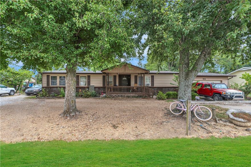 This charming 3-bedroom, 2-bath home sits on a spacious 0.63-acre lot in one of the most sought-after locations in Northwest Arkansas. Just minutes from Downtown Bentonville, Crystal Bridges Museum, The Momentary, and the Coler Mountain Bike Preserve, you'll be living at the crossroads of nature, culture, and convenience. Whether you're a first-time buyer, investor, or looking to downsize without giving up location, this property offers incredible potential. The seller is open to all offers and even willing to provide a credit for updates, making this a rare opportunity to personalize your space in a growing market. With top-rated schools nearby and easy access to Walmart HQ, NWACC, and local trails, 901 Watertower Rd is more than a home — it’s a lifestyle investment.