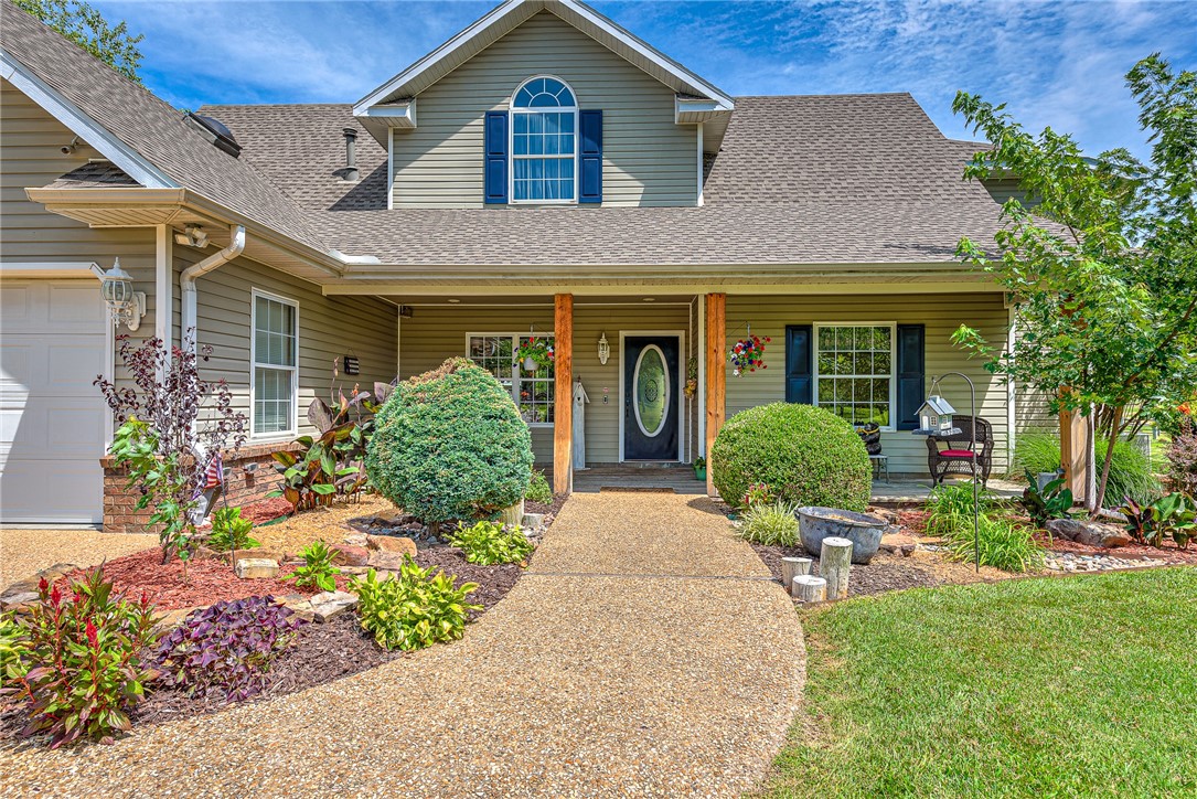 Nestled in a picturesque setting just outside of Springdale, this exceptional home was meticulously crafted by a builder for personal use in 1995. Immerse yourself in the beauty of nature w/ close proximity to Beaver Lake, Sonora, & the East side of Springdale. This house is a true embodiment of the builder's dream home, featuring all the desired amenities. Inside, you will be enchanted by the grandeur of 5 beds, 4 baths, & 3,744 sqft of living space. Equestrian enthusiasts will be thrilled w/ the horse barn, boasting 3 stalls, hay storage, a tack room, & workroom—a perfect haven for horses & their caretakers. Picture eating s’mores and telling stories by the fireside. Practice your aim at the target field, & enjoy endless outdoor play on the 13 stunning acres. The property adjoins a peaceful cattle farm that won’t be developed, ensuring uninterrupted tranquility for many years to come. Don't let this opportunity slip away! Please refer to MLS#1255848 & 1255864.