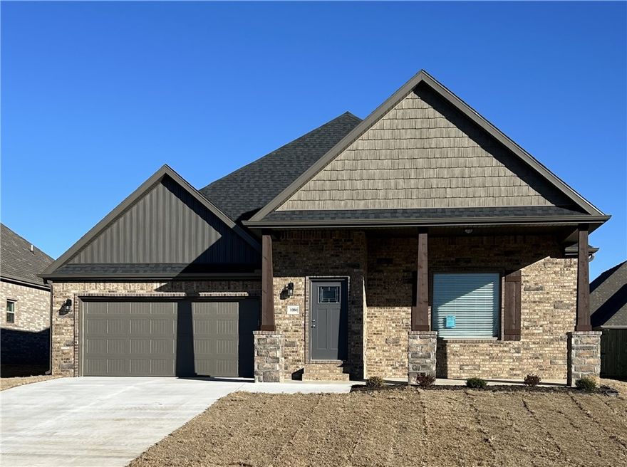 Remarkable new construction 3 bed 2 bath single story home is now available. Complete with SS built-in appliances including gas range and granite countertops. Built-in bookcases flank the shiplap detailed
fireplace in the living room for the perfect architectural focal point. Windows are wood cased and have 2
1/2 in blinds installed. Large front porch, fully sodded yard, landscaping and privacy fence give the home tremendous curb appeal. The back porch is covered and home has fully installed gutters. Keyless pad on garage door for ease of access opens the garage door to a full size garage space. Master bedroom has an oversized 5 x 5 tile shower and the master closet conveniently wraps around into the laundry room located close to the garage for ease of access. Exterior brick and cedar construction for long life and ease of maintenance. Make this your next home. Mailing address is Bentonville, home located inside Centerton city limits. Photos are of similar plan, interior finishes may vary.