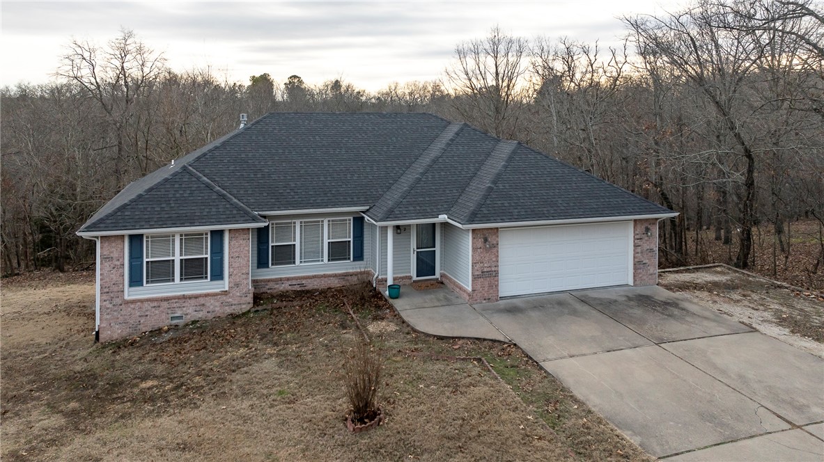 This beautifully remodeled home is ideally located near Lake Windsor and world-class mountain bike trails, with easy access to all of Bella Vistaās offerings. Featuring a split floor plan with 3 bedrooms, 2 bathrooms, and a sunroom, this home combines comfort and style. The lower-level workshop with HVAC is an added bonus (not included in square footage). The kitchen boasts quartz countertops, custom tile backsplash, a kitchen island, and new stainless steel appliances. Both bathrooms feature granite vanity tops and FLEXSTONE surrounds, with a shower door in the master bath. Throughout the home, you'll find 12mm Cortex luxury vinyl plank flooring in high-traffic areas and wet spaces, complemented by new carpeting in the bedrooms. Off-street parking is available in addition to the driveway. Bella Vista offers resort-style living with golf, tennis, fitness centers, pools, trails, disc golf, and more. Visit the Bella Vista POA website for full details!