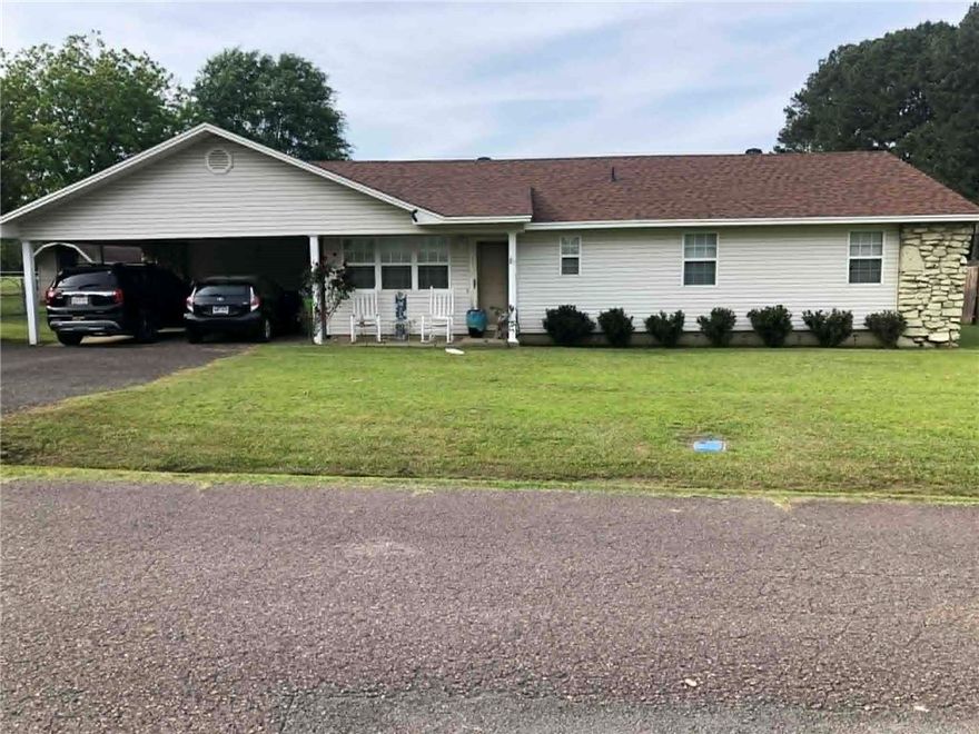 NICE  4 bdr, 2 bth home featuring CH&A unit & Roof are less than 5 years old, new flooring, nice backyard, Atkins School District.  Many updates, selling "as-is"