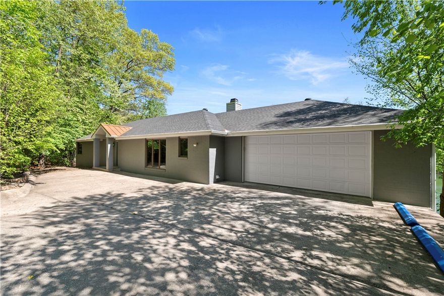 Nestled on a serene 1.44-acre lot with over 200 feet of lake-frontage on Lake Loch Lomond, this enchanting real estate gem offers the epitome of privacy. Situated at the end of a tranquil cul-de-sac, this property boasts four bedrooms, two full, and two half bathrooms. The HVAC was replaced last year and the roof is less than 5 years old. With an upper and lower deck overlooking the picturesque lake, it's perfect for unwinding or entertaining guests amidst breathtaking scenery. Storage is abundant, with a surplus of closets and cabinetry. Additionally, the property features an extra garage specifically designed to house your lake toys, ensuring convenience whenever adventure calls. Enjoy exclusive access to your private swimming and small watercraft dock, providing endless opportunities for waterfront fun. Whether you seek solitude or to embrace the great outdoors, this property offers the perfect blend of seclusion and recreation. Come make all your lakeside living dreams come true!