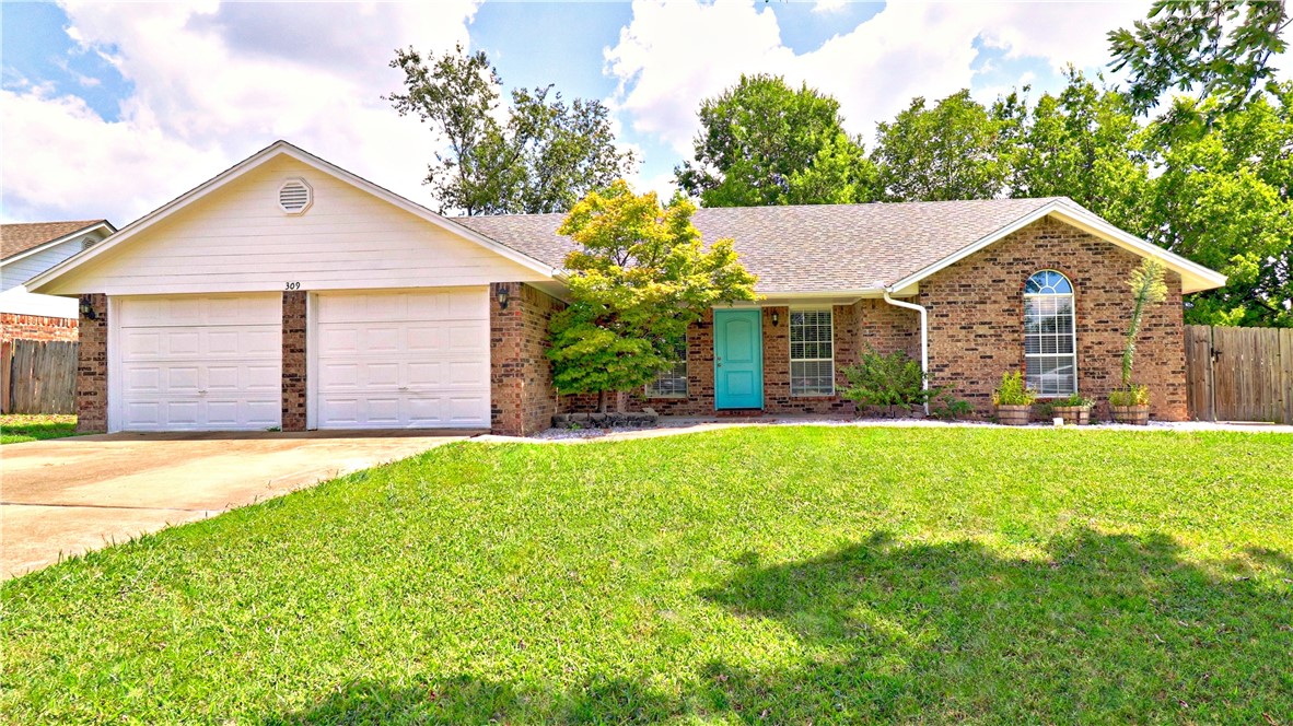 Located in a unique neighborhood made up of just four streets and three cul-de-sacs, this beautifully updated 3-bedroom, 2-bath home offers 1,814 sq ft of stylish living space. Every detail has been thoughtfully enhanced, from the fresh paint and new flooring to the updated lighting throughout. The spacious living room features a stunning built-in feature wall and cozy gas fireplace, seamlessly opening to the eat-in kitchenāperfect for entertaining. The kitchen boasts quartz countertops, a chic glass subway tile backsplash, and a gas cooktop for the home chef. Both full bathrooms include dual sinks, separate showers and tubs. Enjoy the privacy of a split floor plan and unwind in the bright sunroom. Step outside to a large, shady, fully fenced yard with a charming she shed, greenhouse, raised garden beds, and a patio with gas hookupāideal for outdoor gatherings. This move-in-ready gem combines comfort, style, and outdoor living. Donāt miss your chance to make this peaceful retreat your next home!