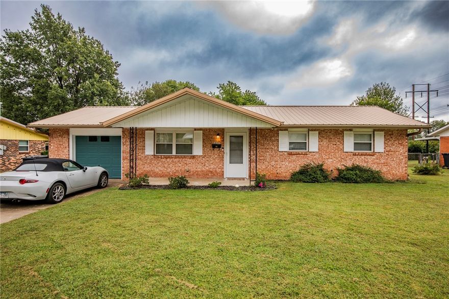 Charming 3 bedroom, 2 bathroom home in Springdale with fresh paint and all new flooring throughout! Enjoy a fenced-in backyard perfect for pets or outdoor gatherings, plus a 1-car garage for convenient parking or storage. The home features a low-maintenance brick exterior and durable metal roof for long-lasting value. Great location just half a mile from JB Hunt Park, offering quick access to trails, sports fields, and recreation. Move-in ready and full of updates!