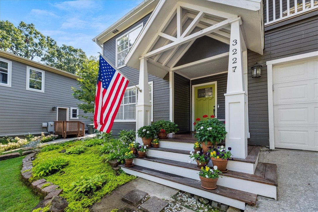 Nestled on a quiet cul-de-sac, this home captures the nostalgic charm of all-American living in a wonderful community. Beautiful stone and wood details frame a 2-car garage with a patio over looking you're private setting. Inside, you’ll find 5 bedrooms, including two that can serve as primary suites, and 3.5 baths. The updated kitchen with its open layout flows seamlessly into a cozy sunken living room, creating an inviting space for everyday living, while the backyard patio is perfect for entertaining or relaxing with your favorite book. Just 1 mile from top Fayetteville schools and a quick bike ride to Niokaska Creek Trail, this home offers both comfort and convenience
